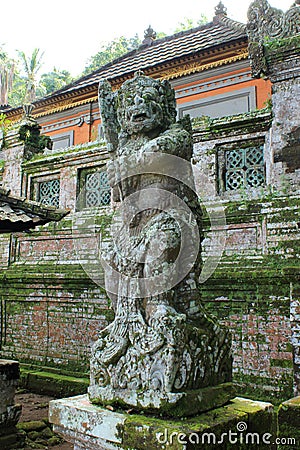 Guardian demon statue at Bali Hindu temple Stock Photo