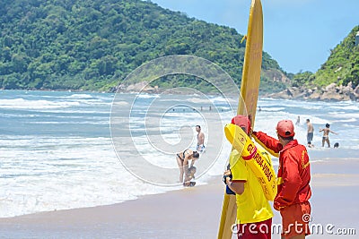 Lifeguards of Praia do Tombo beach, Guaruja SP Brazil Editorial Stock Photo