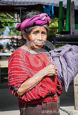 Guatamalian woman carry her bag in Panajachel, Guatemala. Editorial Stock Photo