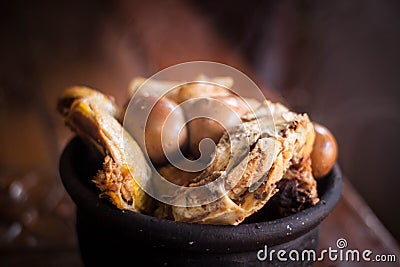 Gudeg traditional exotic indonesian food with kendil and wooden table Stock Photo