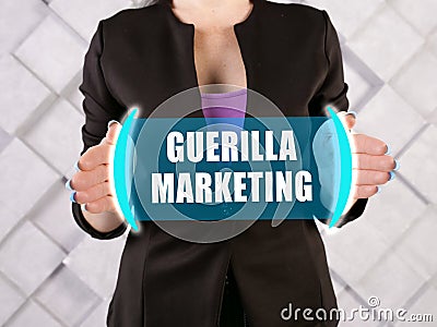 GUERILLA MARKETING text in virtual screen Stock Photo