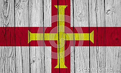 Guernsey Flag Over Wood Planks Stock Photo