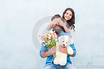 Guess who. Happy daughter clothes fathers eyes with hands. Playing guessing game. Birthday surprise. Surprise gift Stock Photo