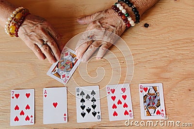 Guessing cards reading, grandma magic, fortune telling, women hands, destiny prediction Stock Photo