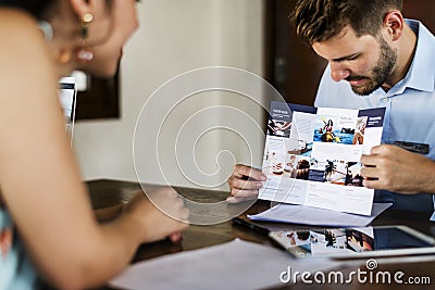 Guest booking a tour at a hotel Stock Photo