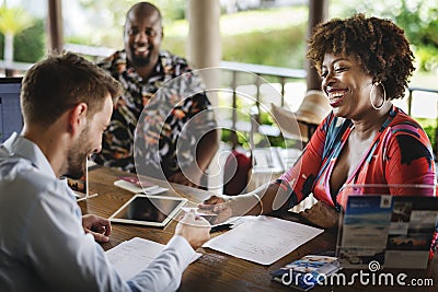 Guests checking in to a hotel Stock Photo