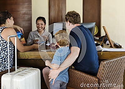 Guests checking in to a resort Stock Photo