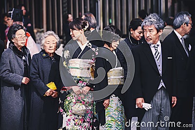 Guests during traditional Japanese wedding ceremony held in the Meiji Jingu Shrine . Editorial Stock Photo