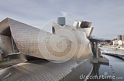 The Guggenheim Museum Bilbao, along the river Nerv Editorial Stock Photo