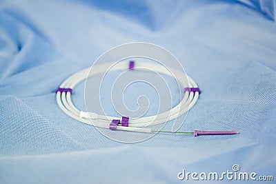 Guide wire to internal carotid vein for angio Stock Photo