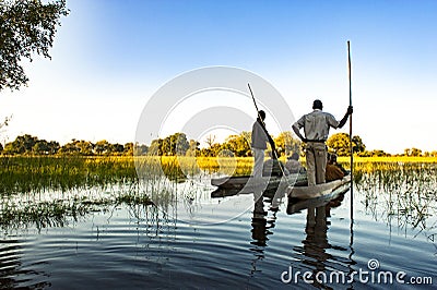 Guided Okavango Trip, Dugout Canoe, Botswana Editorial Stock Photo