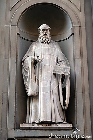 Guido Aretino, statue in the Niches of the Uffizi Colonnade in Florence Editorial Stock Photo