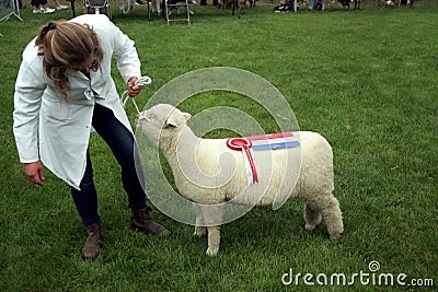 Guildford, England - May 28 2018: Woman breeder and her prize wi Editorial Stock Photo