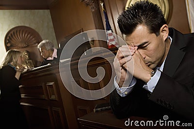 Guilty Man In Court Room Stock Photo