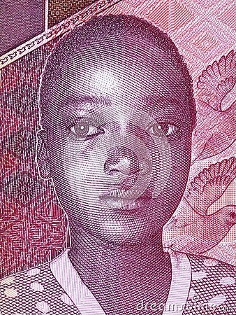 Guinean boy, a portrait from money Editorial Stock Photo