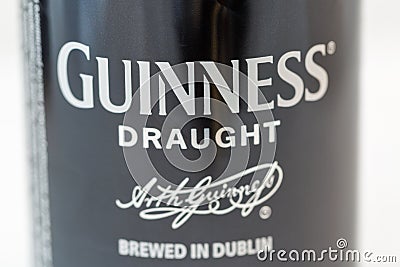 Guiness draught beer can closeup against white Editorial Stock Photo