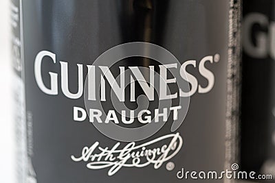 Guiness draught beer can closeup against white Editorial Stock Photo