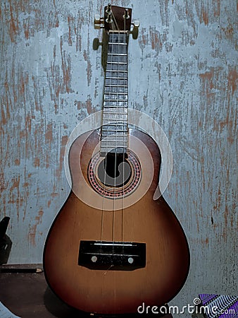 guitar gives calm when we strum it with feeling Stock Photo