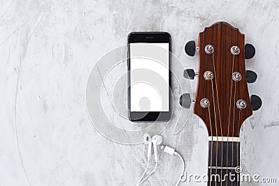 Guitar and phone mobile white screen showing white screen top vi Stock Photo