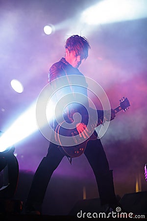 Guitar player on stage, the Prodigy, concert in Russia 2005 Editorial Stock Photo