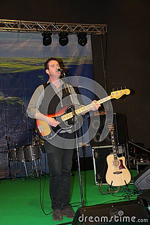 The guitar player of Kilkennys Editorial Stock Photo