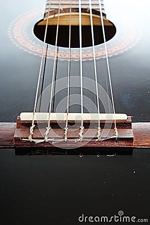 Guitar string closeup. POV artsy black shiny reflective guitar studio photo. Cartoon Illustration