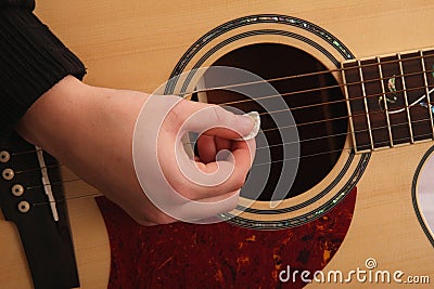 Guitar Strumming Stock Photo