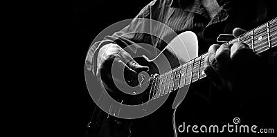 Guitarist hands and guitar close up. playing electric guitar. play the guitar. copy spaces. Stock Photo