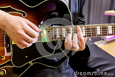Guitarist playing in jazz band Stock Photo