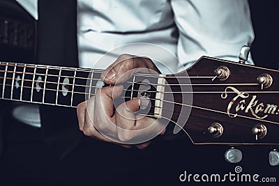 The guitarist plays the guitar the top view Editorial Stock Photo