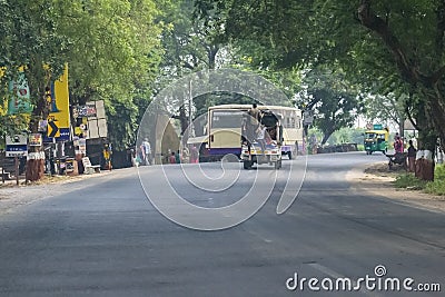 Gujarat State Highway with Green Trees Editorial Stock Photo