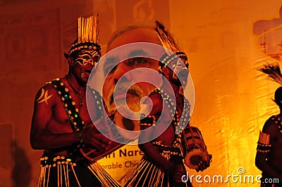Gujarati tribal people show at the travel mart in Ahmedabad with Editorial Stock Photo