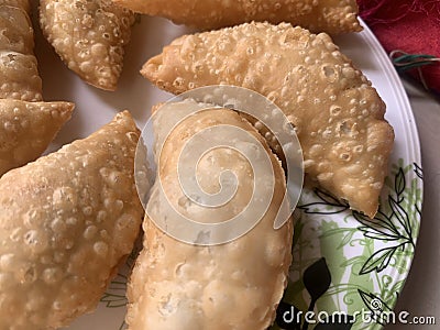 Gujiya or gujia or karanji - sweet dumplings. Indian snack made on diwali, holi and for celebrations Stock Photo