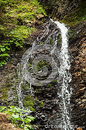 Guk Waterfall in Carpathian mountains in summer. Beautiful nature of Ukraine Stock Photo