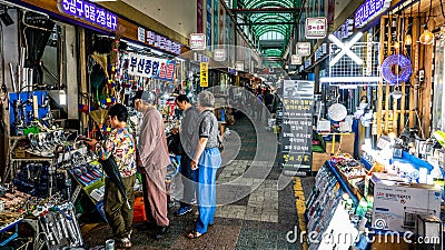 Gukje market alley view with people and homeware shops in Busan South Korea Editorial Stock Photo