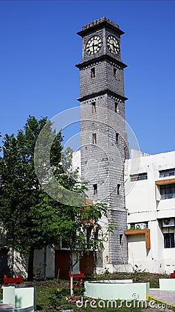 Gulbarga university library clock tower isolated in blue sky Editorial Stock Photo