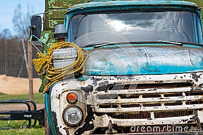 Vintage Soviet truck ZIL 130 in the village, close-up front details Editorial Stock Photo