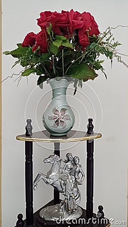 Guldasta decoration piece Flower pot on corner table Stock Photo
