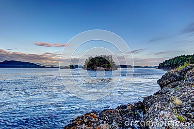 Rocky shorelines along the Gulf Islands off the shores of Vancouver Island Stock Photo