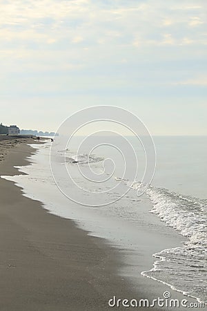 Hazy and cloudy morning on the Gulf of Mexico after a storm. Stock Photo