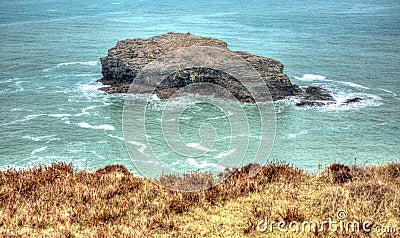 Gull Rock Portreath North Cornwall England UK between St Agnes and Godrevy in HDR Stock Photo