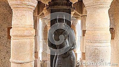 Gullakayajji or granny holding eggplant, 5ft tall statue opposite statue of Gomateshwara, Shravanabelagola, Karnataka, Stock Photo