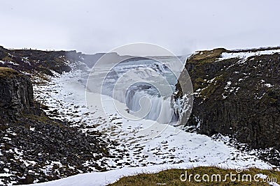 Gullfoss waterfall from Reykjavik in Iceland. A half frozen triangle as the Hvita River falls into a wintry gorge in Western Stock Photo