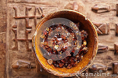 Gum arabic, also known as acacia gum - in bowl Stock Photo