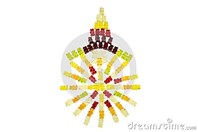 A gummy bear arrangement in rainbow colours consisting of a circle and a tip on top. The lighter larger one in the upper part of Stock Photo