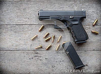 Gun on wood Stock Photo