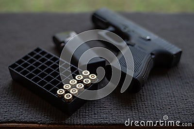 Gun and bullet Stock Photo