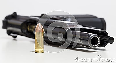 Gun and Bullet Stock Photo