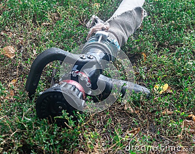 Gun fire on green grass during the day Stock Photo