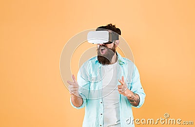 Gun gesture. Shooting gallery. Man virtual reality headset. First person shooter. Play game. Gaming hobby. Cyber gaming Stock Photo